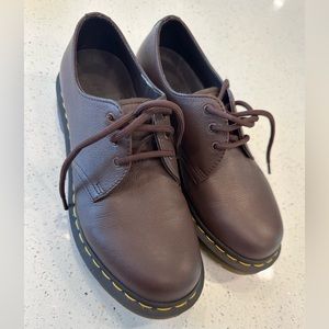Worn once doc martens 3 hole laced shoes.   Perfect condition size 8 brown.